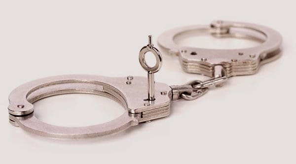 At Your Service Bonding Company | York County, Lancaster County, Chester County | bail bond image with handcuffs
